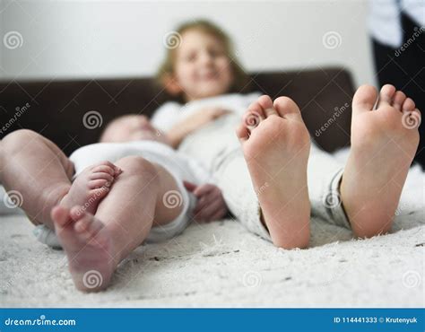 feet  young children stock image image  sister