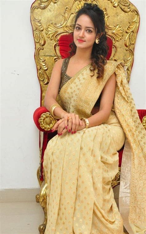 south indian hot girl shanvi srivastava hip navel stills in yellow saree kollywood stars