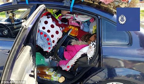 Girl Buried Under Luggage In Overloaded Car In Spain Daily Mail Online