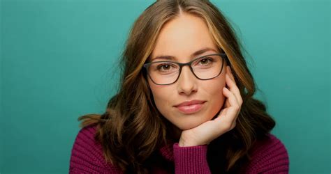 Stock Video Clip Of Beautiful Young Brunette Woman Wearing Spectacles