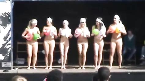 naked ladies dance on stage with balloons