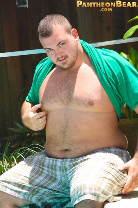 chubby dude hunter posing outdoors