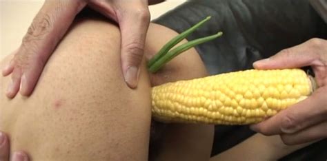 titless and kinky japanese brunette gets her pussy polished with a corn