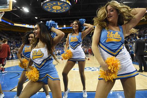 ucla cheerleader takes two hard falls but bounces back nz herald