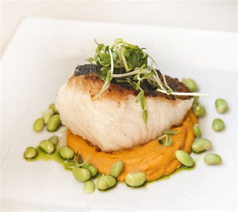 Asian Style Sea Bass With A Carrot Ginger Puree And Edamame