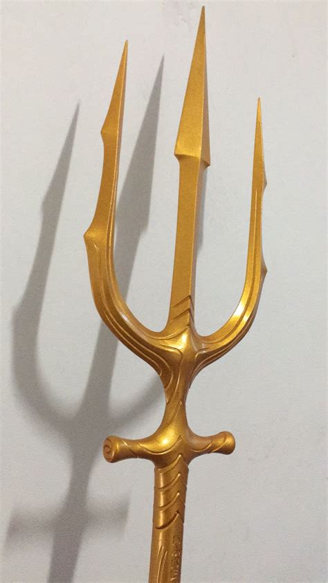 gold aquaman trident