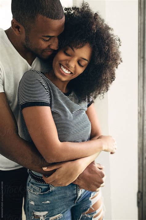 young black couple embracing  home  stocksy contributor bonninstudio stocksy