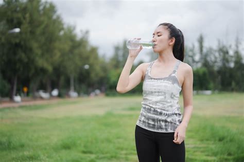 Premium Photo Asian Women Drink Water After Exercising