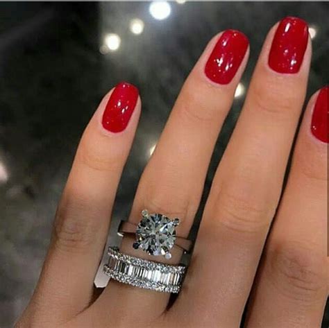 engagement ring and wedding band burgundy nails winter
