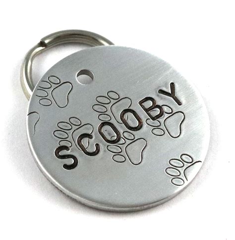 fun metal pet id tag  paw prints hand stamped dog  tag critter bling