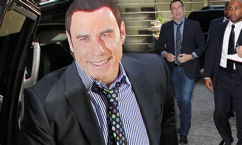 john travolta dons toupee and jokes with fans despite being enveloped in sex scandal daily