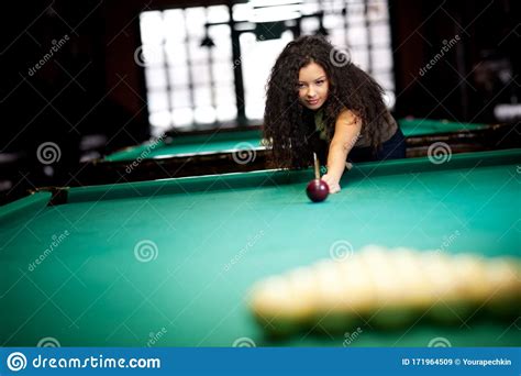 beautiful girl playing billiards stock image image of attractive