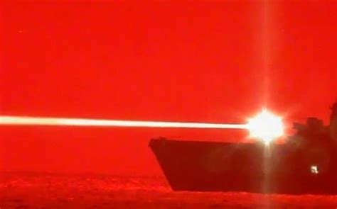 navy warship    high energy laser  shoot  drone  mid flight stars  stripes