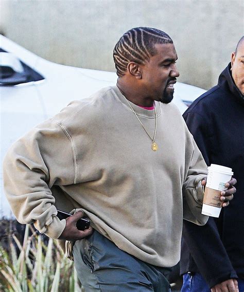 kanye west shows  dramatic  hairstyle   claimed  spends