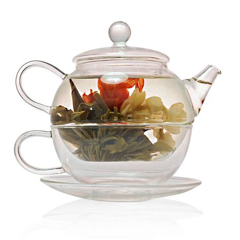 tea   glass teapot  cup saucer ml   exotic teapot notonthehighstreetcom