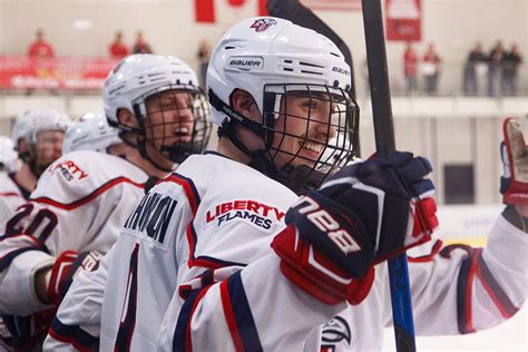 acha  mens hockey team rides  game win streak  national championships liberty news