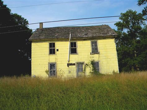 abandoned yellow house     place  wor flickr