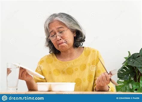Unhappy Asian Senior Woman Anorexia And Say No To Ready Meals Elderly
