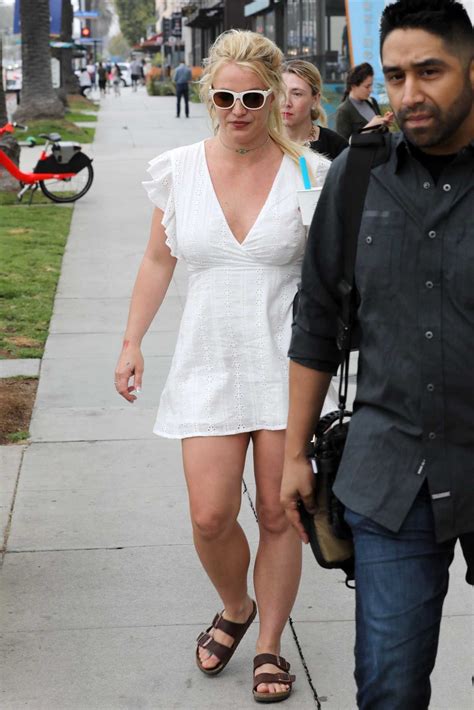 britney spears in a white dress was seen out in santa