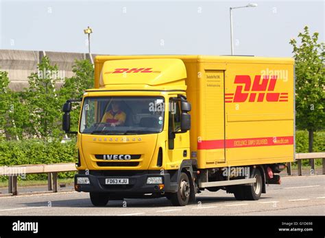 yellow dhl lorry  london heathrow airport stock photo royalty  image  alamy