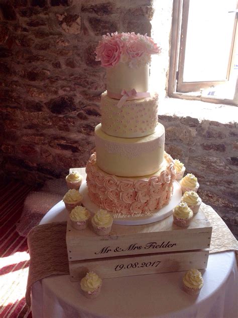 beautiful four tiered buttercream wedding cake