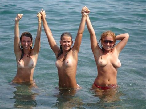 three teens topless in ocean beach babes