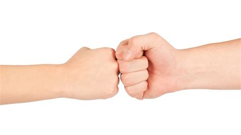Handshakes Are Out Fist Bumps Are Now In And More Healthy