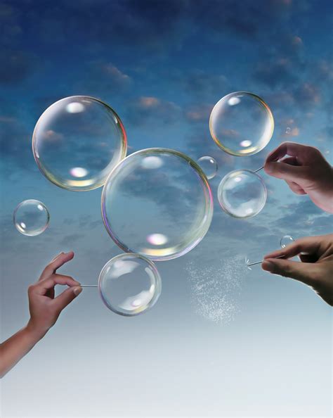 hands bursting bubbles stock images