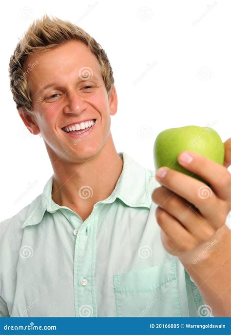 handsome young man holding  apple stock image image  businessperson attractive