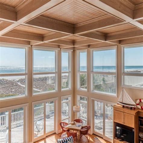 ocean front beach house  cathedral ceilings  tan wood  bead