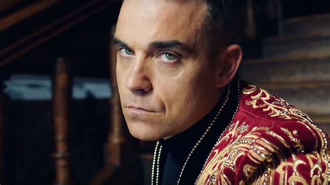 robbie williams accused of anti russia racism on new