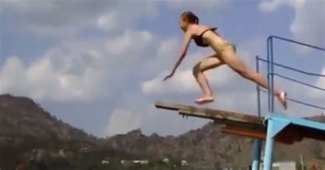 bikini clad girl s epic fail as she attempts to perform sexy dive off wooden plank mirror online