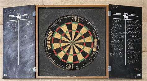 traditional wall cased dart board opening  reveal black board scoring boards traditional british