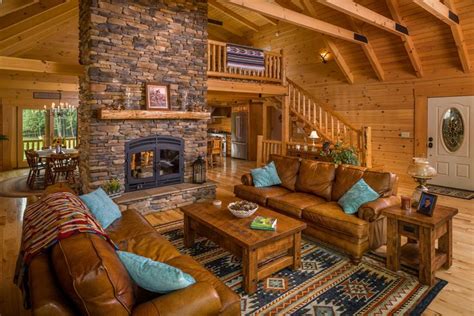 great room  double sided fireplace cabin interiors log home interiors cabin living room
