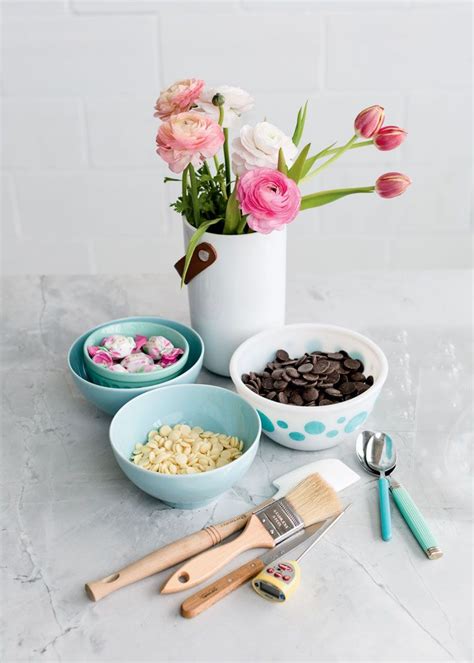 flowers bowls  utensils  sitting   table