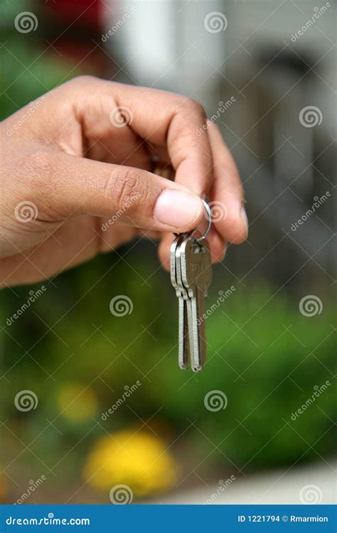 handing   keys stock photo image  building mexican