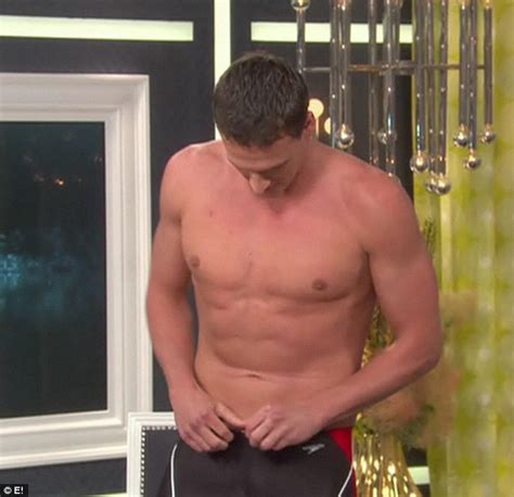 ryan lochte is an arresting sight as he strips down to reveal his gold