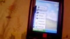 Sony Ericsson K800i with Windows XP startup/shutdown, splash and menu