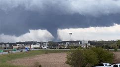 Siren Blares as Large Tornado Moves Through Lincoln, Nebraska
