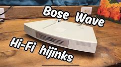 What's inside a CD changer? Bose Wave diagnosis and fix