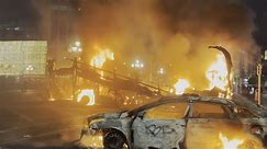 Tände eld på fordon och plundrade affärer - våldsamt upplopp i Dublin