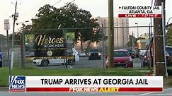 Trump turns himself in at Georgia jail