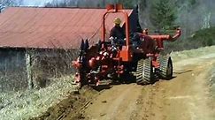 Ditch Witch RT80 Quad Vibratory Plow with Reel Carrier