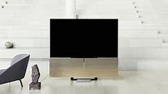 Bang & Olufsen’s 77-inch Beovision Harmony TV dominates a room, tucks itself away