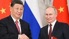 Xi Jinping and Vladimir Putin pledge to shape a new world order