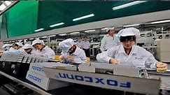 Foxconn to replace workers with 1 million robots - video Dailymotion