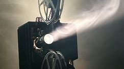 Vintage Film Projector Rolling Film Stock Footage Video (100% Royalty-free) 10527470 | Shutterstock