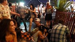 ‘People started dropping around us’: Las Vegas shooting told by witnesses
