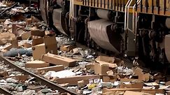 Plundered packages litter LA train tracks after thieves swipe items from cargo containers