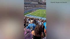 Chargers fan wallops Raiders fan at SoFi Stadium